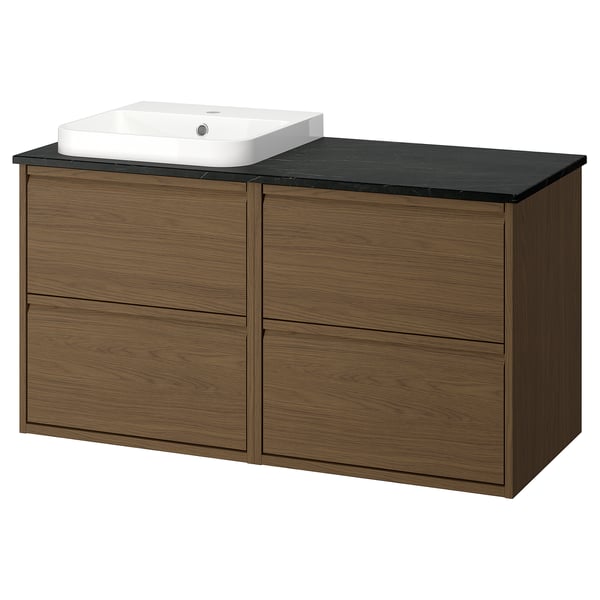 Modern brown oak bathroom cabinet ÄNGSJÖN with marble top, angled basin, and multiple drawers.