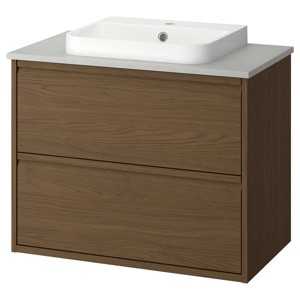 Modern wooden brown bathroom vanity with light grey countertop and square white basin.