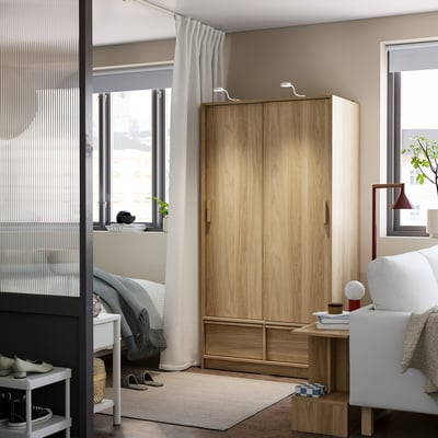ANKARUDDEN Wardrobe with sliding doors, oak effect, 38 3/4x23 5/8x74 3/4 "