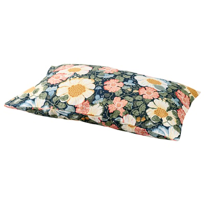 Floral pillow with peach, yellow, and green flowers on a navy background, rectangular shape, soft material.