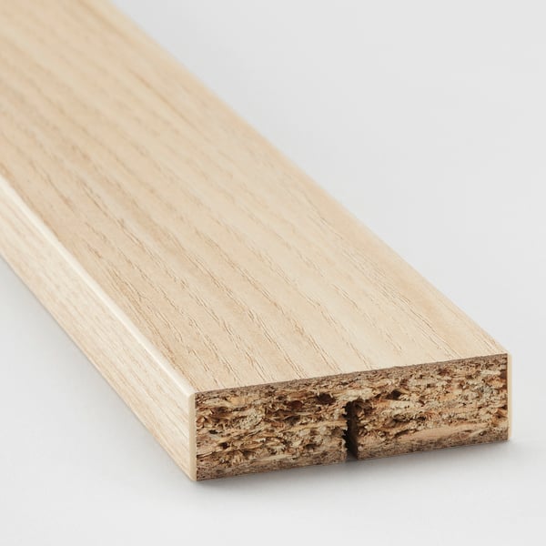 Light wood with smooth top, textured underside.