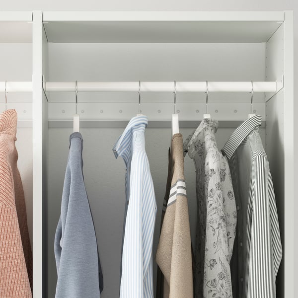 Closet with adjustable shelves and hangers.