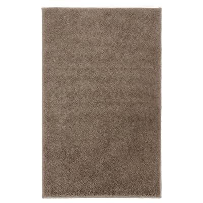 A BACKMÅRA bath mat in grey. Its square-shaped, made from recycled polyester, and a soft, plush surface.