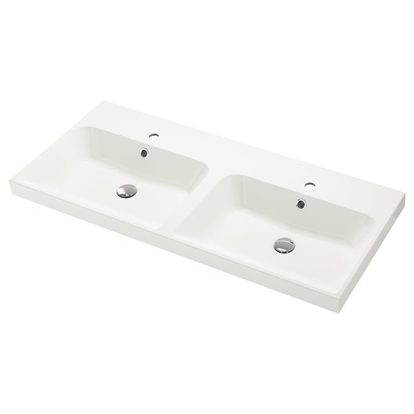 A white BACKSJÖN marble sink with two basins, chrome fixtures, and a sleek, modern design.