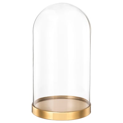 Clear glass dome on gold base, displays items.