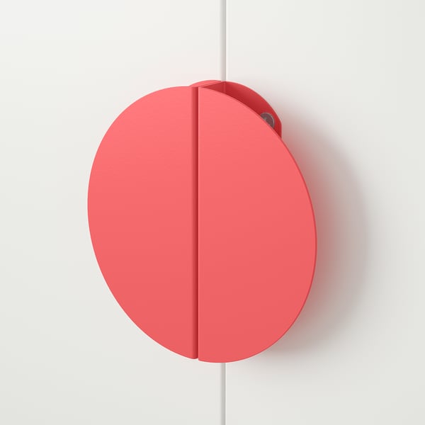 Red circular handle, smooth texture, mounted on a white wall.