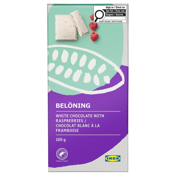 IKEAs BELÖNING: raspberry white chocolate bar packaging, showing creamy bar and raspberries, weighs 100g, note health canada warnings.