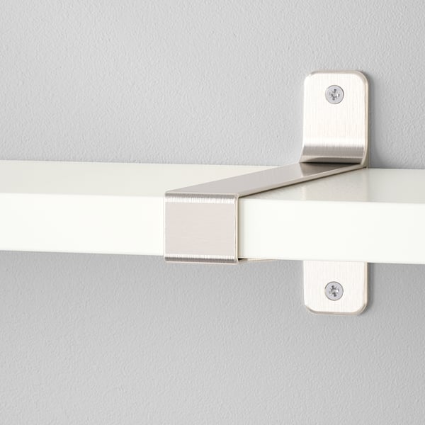 Sturdy metal wall shelf brackets securely fastened to beige wall, supporting modern, white shelf with clean, rounded edges.