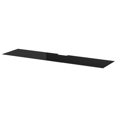 This is a black glass panel for a BESTÅ tv bench, sleek and modern in design, rectangular in shape with a protective glossy finish.