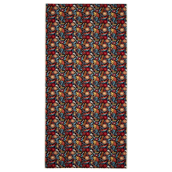 BLÅRAPUNKEL fabric: rectangular with dark floral print in red, orange, yellow, blue on dark background, 100% cotton.