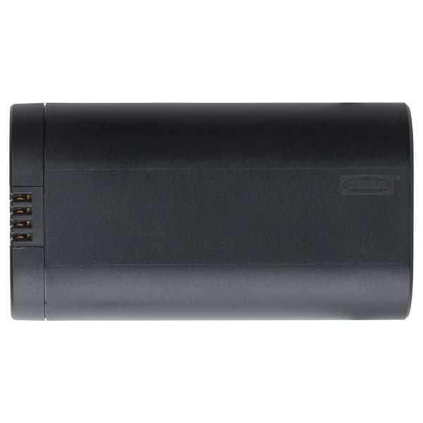 A black BRAUNIT battery pack, rectangular, made of polycarbonate plastic, with a smooth design and usb port on one side.