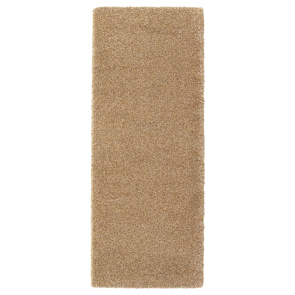 Beige polypropylene carpet runner with rubber backing, rectangular and plush.