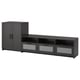 Image BRIMNES black tv storage set with cabinet & drawers, sleek design, glass fronts.