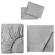 A light grey DVALA bed sheet set made from 100% cotton. It includes a fitted sheet, a flat sheet, and two pillowcases, all neatly displayed.