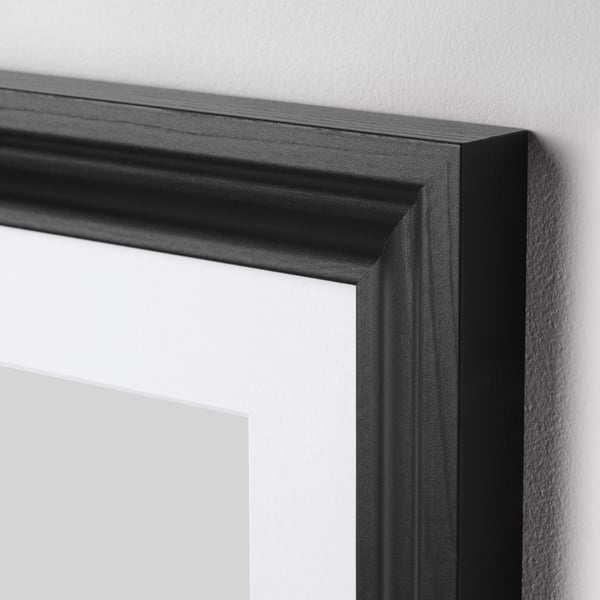 Black picture frame with smooth, sturdy edges, suitable for wall or table display.