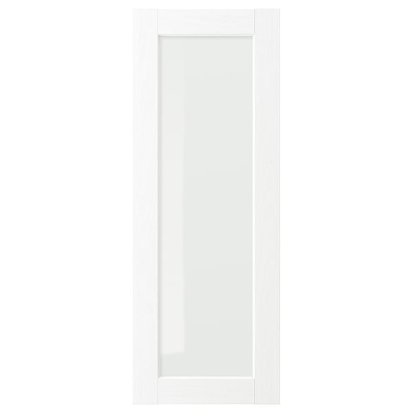 A white ENKÖPING cabinet door with a frame and clear glass panel in the centre, featuring a sleek and minimalist design.