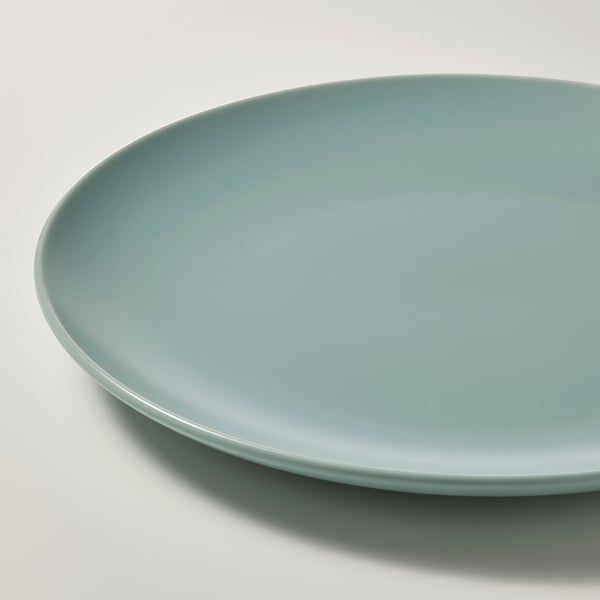 Light green FÄRGKLAR matte plate on white background.