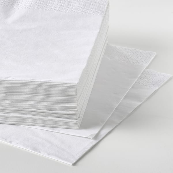 Stack of pristine white FANTASTISK napkins shown in well-organized piles, highlighting their soft, absorbent texture.