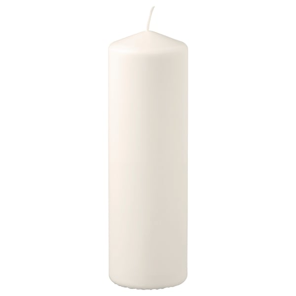 White FENOMEN candle, cylindrical shape, made of plant-based wax and cotton wick.