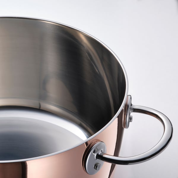 FINMAT pots polished interior quality craftsmanship; reflects light beautifully. Stainless steel handle mounts firmly, ensuring safe handling.