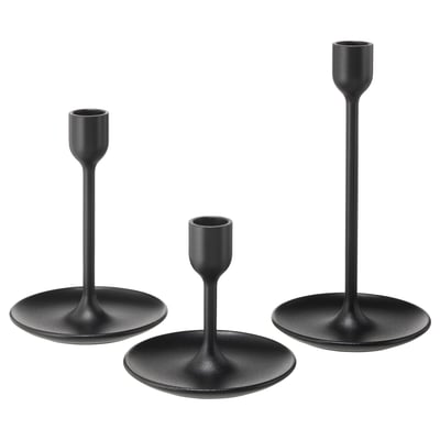 Three black modern candlesticks in varying heights, sleek aluminium design with felt pads for stability.
