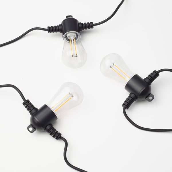 Image displays three vintage-style filament light bulbs each connected to black cords with black sockets. Perfect for outdoor use.