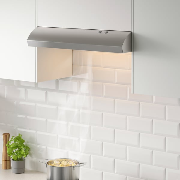 Stainless steel genomdrivia hood with led, built-in, above stove.