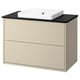 Havbaeck bathroom vanity in beige with black countertop and square white basin.