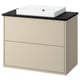 Modern beige bathroom vanity with black countertop and square white sink.