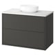 Modern grey bathroom vanity with marble counter and round white basin.