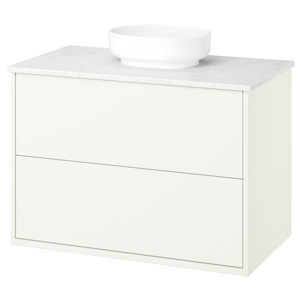 White modern bathroom vanity with marble counter and bowl.