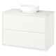 White modern bathroom vanity with marble counter and bowl.