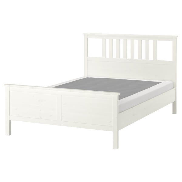 White HEMNES solid wood bed, sleek design, sturdy headboard, adjustable sides.