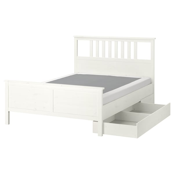 White wooden bed with storage drawers, clean design, ideal for space-saving.