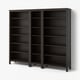 Three tall dark wood bookcases, two with open shelves and one with a mix of open and closed storage. Modern, simple design, ideal for storage.