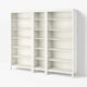 Two white wooden HEMNES bookcases, each with six adjustable shelves for versatile storage, featuring a traditional design.
