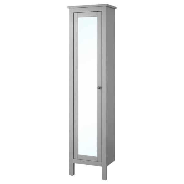 A tall, grey HEMNES cabinet with a full-length mirror on the door. It has a sleek design and abundant storage space.