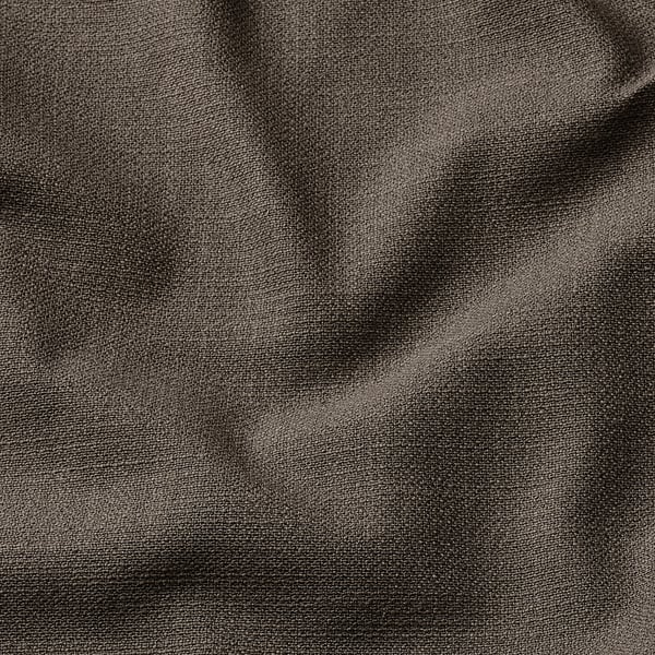 Close-up of luxurious, textured fabric with subtle sheen, indicative of quality and comfort.
