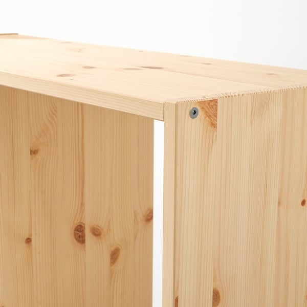 Natural wood shelf detail, showing smooth finish and precise joinery.