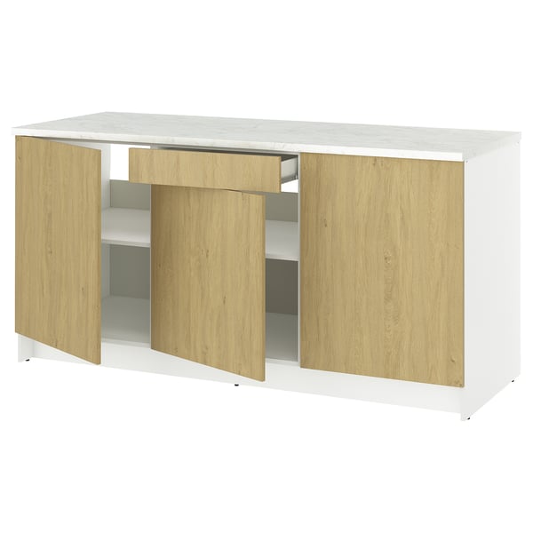 A KNOXHULT kitchen unit with light wood doors, a white marble top, and a drawer for storage.