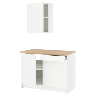 Moderne white kitchen cabinet set with oak top. Sleek, compact design with shelves, drawers.