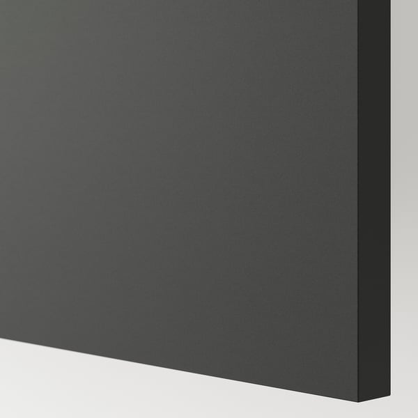 The corner of a sleek, dark grey KNOXHULT kitchen cabinet. It smooth, scratch-resistant surfaces with clean, modern edges.