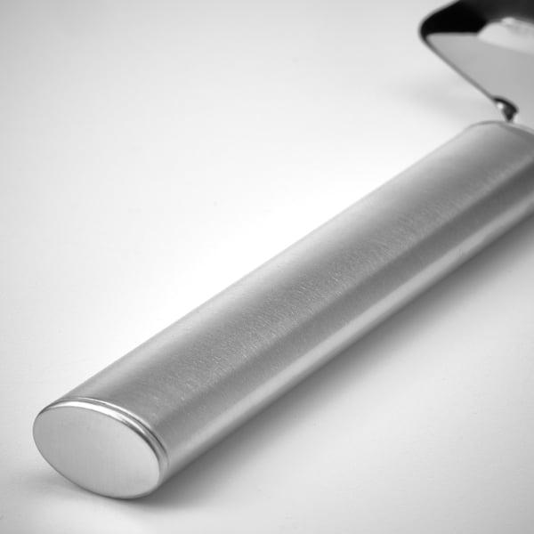 Stainless steel cheese slicer with sleek, reflective surface and ergonomic handle.