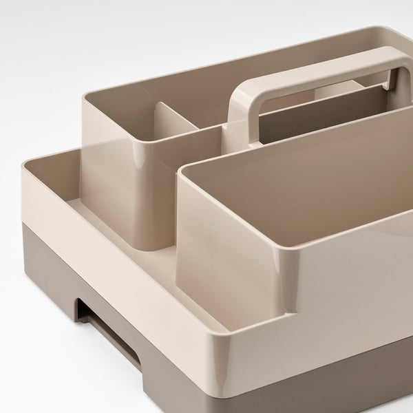 Desk organiser with multiple compartments, sturdy, beige, handle on top.