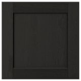 A black LERHYTTAN drawer front with a wooden frame and bevelled edges, featuring an inset veneer panel.