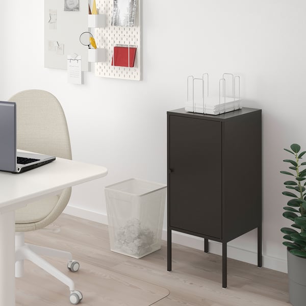 LIXHULT black storage cabinet on legs, functional and stylish, fits neatly in modern spaces with minimalist decor.