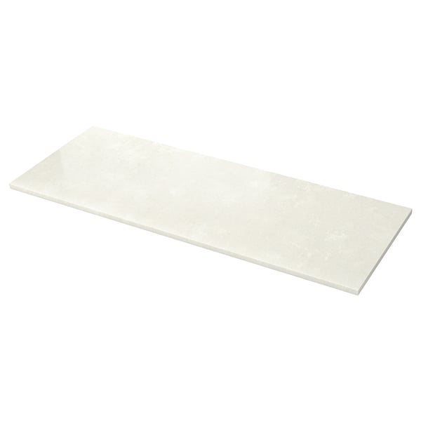 An off-white LOCKEBO worktop made from recycled glass composite. Its rectangular, smooth, and non-porous.