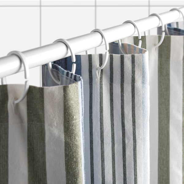 Striped shower curtain with liner for privacy.