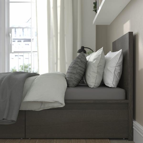 Bedframe with headboard, large under-bed storage, and adjustable bed sides for various mattress thicknesses.