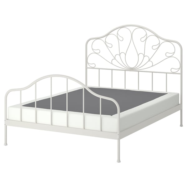 White MELLGRUND bed, ornate metal design, curved headboard.